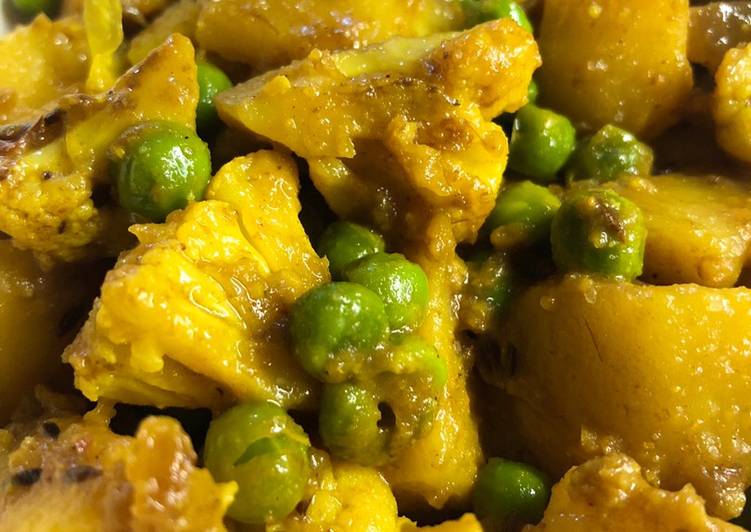 Tasty And Delicious of Potato, cauliflower and pea curry - vegan