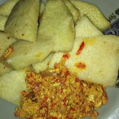 A picture of Fried yam and scrambled eggs.