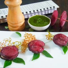 Roasted Beetroot Bites with Coriander Chutney Tuile A picture of Roasted Beetroot Bites with Coriander Chutney Tuile.