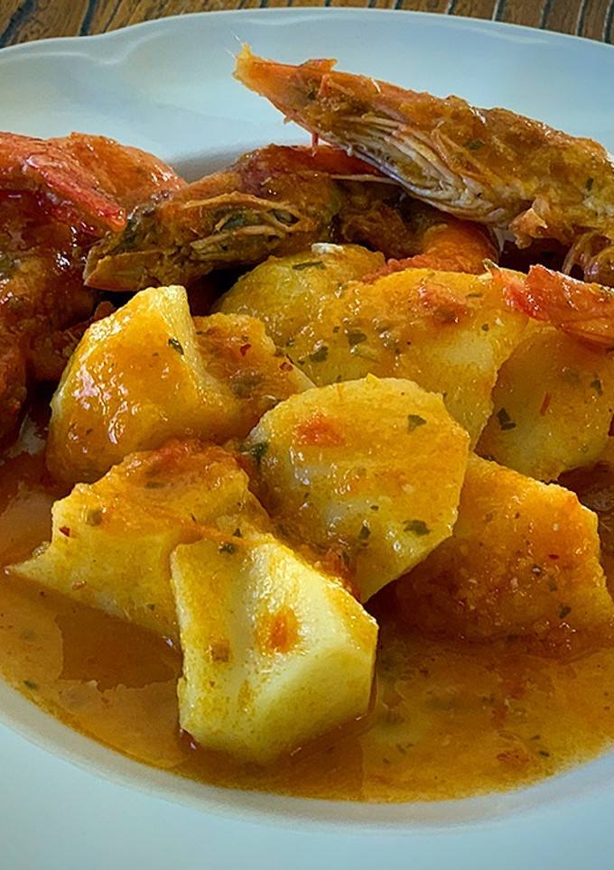 Una foto de Patatas con langostinos