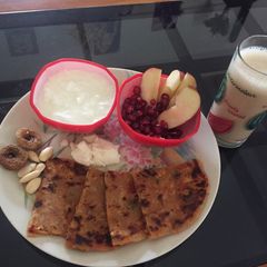 A picture of #Breakfast#Paneer Soya parantha with curd and butter.
