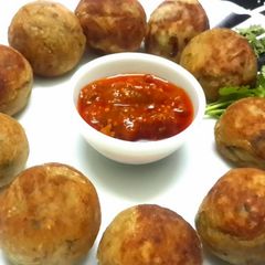 A picture of Coconut Stuffed Potato Kachori.