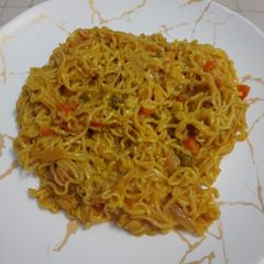 A picture of Cheese garlic noodles.