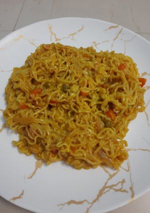 A picture of Cheese garlic noodles.