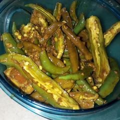 A picture of Green chilli pickle.
