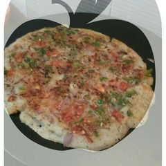 A picture of # Tiffin box # Rava uttapam.