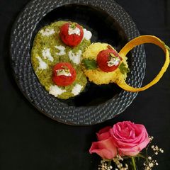 A picture of Paneer Kofta in Pistachio Gravy.