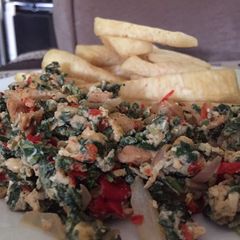 A picture of Fried yam with spinach.