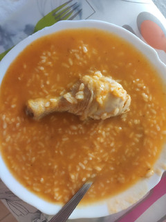 Una foto de Arroz caldoso con pollo