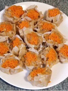 A picture of Shrimp and Chicken with mushroom Shu Mai.