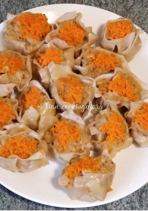 A picture of Shrimp and Chicken with mushroom Shu Mai.