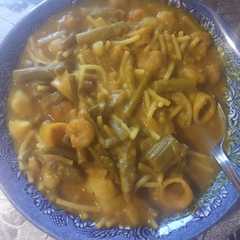 Una foto de Guisado calamar y gambas en olla rápida