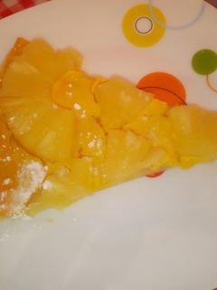 Una foto de Pizza dulce de hojaldre con natillas