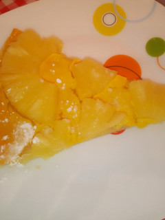 Una foto de Pizza dulce de hojaldre con natillas