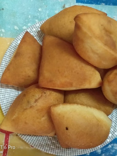 A picture of Soft Saffron mandazi#mycreativesoftmandazicontest#4wkschallenge#.