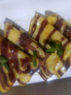 A picture of Marble pancakes with maple syrup.
