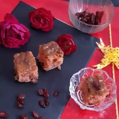 A picture of Orange dry fruit cake.
