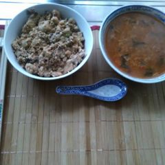 A picture of Japanese pork dice up scrambled eggs sho chiku Bai sake.