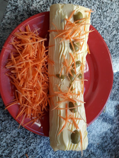 Una foto de Pionono agridulce de lomito de atún