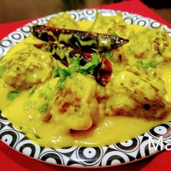 A picture of Punjabi Kadhi Pakoda.