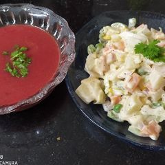 Beetroot soup with Mexican salad A picture of Beetroot soup with Mexican salad.