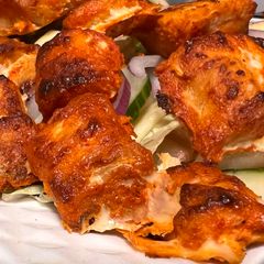 A picture of Tandoori salmon bites.