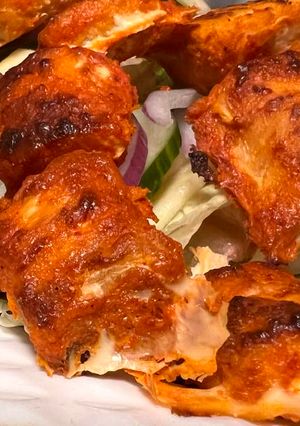 A picture of Tandoori salmon bites.
