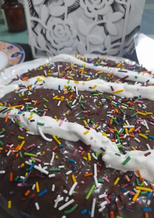 A picture of Chocolate cake with ganache.