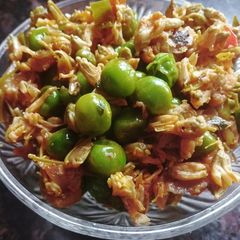 A picture of Drumstick flower  and peas bhaji.