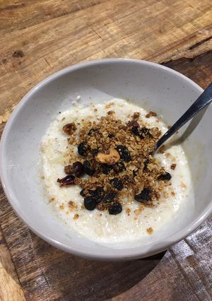 A picture of OatMilk Porridge with Granola.