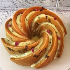 A picture of Blueberry Lemon Bundt Cake with Passionfruit Icing.