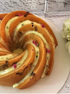 A picture of Blueberry Lemon Bundt Cake with Passionfruit Icing.