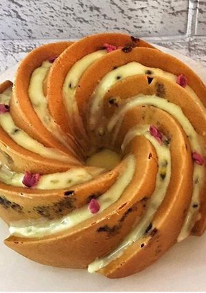 A picture of Blueberry Lemon Bundt Cake with Passionfruit Icing.