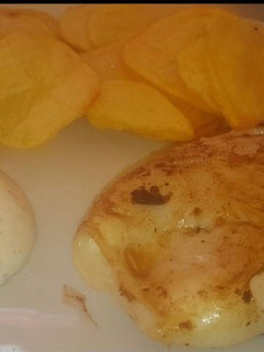 Una foto de Calamar braseado relleno de bacon y queso