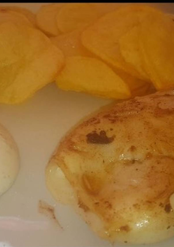 Una foto de Calamar braseado relleno de bacon y queso