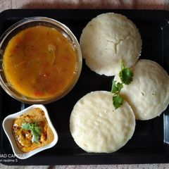 Idli sambhar with chutney A picture of Idli sambhar with chutney.