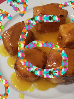 Una foto de Leche frita flambeada