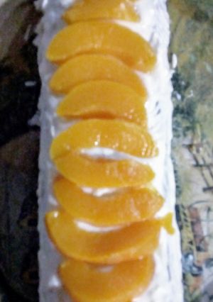 Una foto de Postre de duraznos