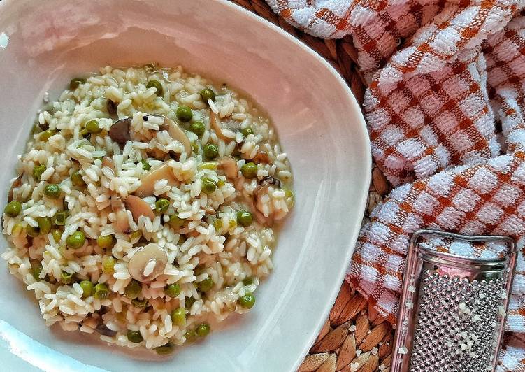 Risotto piselli e funghi