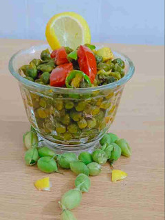 વઘારેલા લીલા ચણા (Vagharela Lila Chana Recipe In Gujarati) રેસીપી મુખ્ય ફોટો