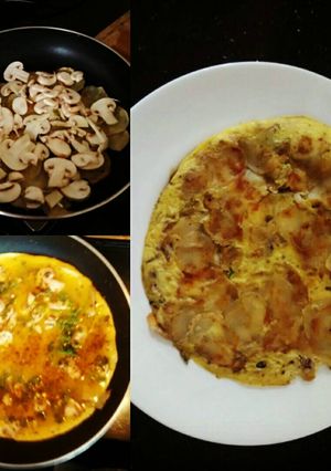 A picture of Mushroom Omelette with Sliced Potato..