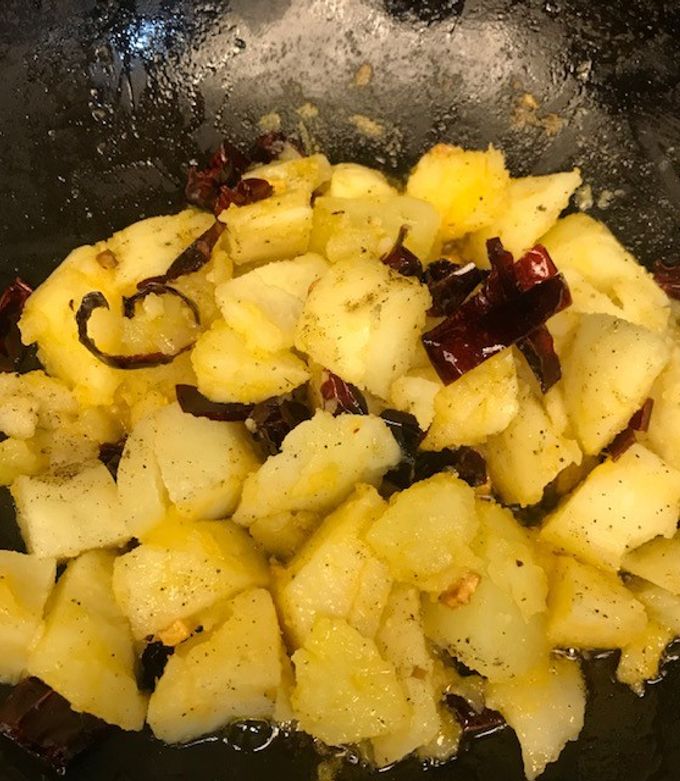 Una foto de Papas al ajillo