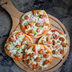A picture of Mini pizza(without cheese).