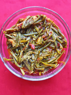 A picture of Cluster beans (Guvar phali) and onion subji.