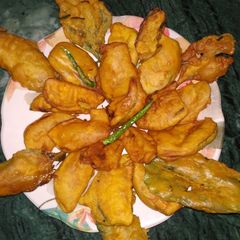 A picture of Palak Brinjal Pokoda.