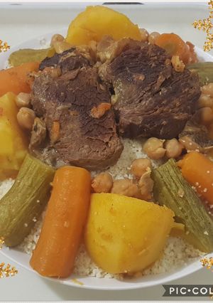 A picture of Couscous with Vegetables in Red Sauce.