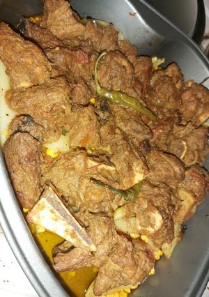 A picture of Mutton with steam veggies.