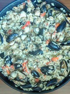 Una foto de Arroz caldoso de berberechos y mejillones