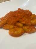 Gnocchi di Zucca con Pancetta e crema di Ciliegino