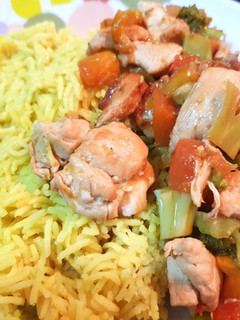 A picture of Papaya Chicken with Turmeric Rice.